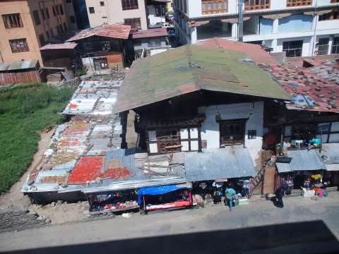Thimphu Above the markets overlooking chillies drying